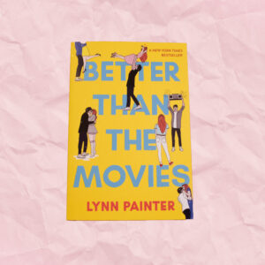 Yellow book cover with a boy and a girl doing five different movie poses. Blue and red text.